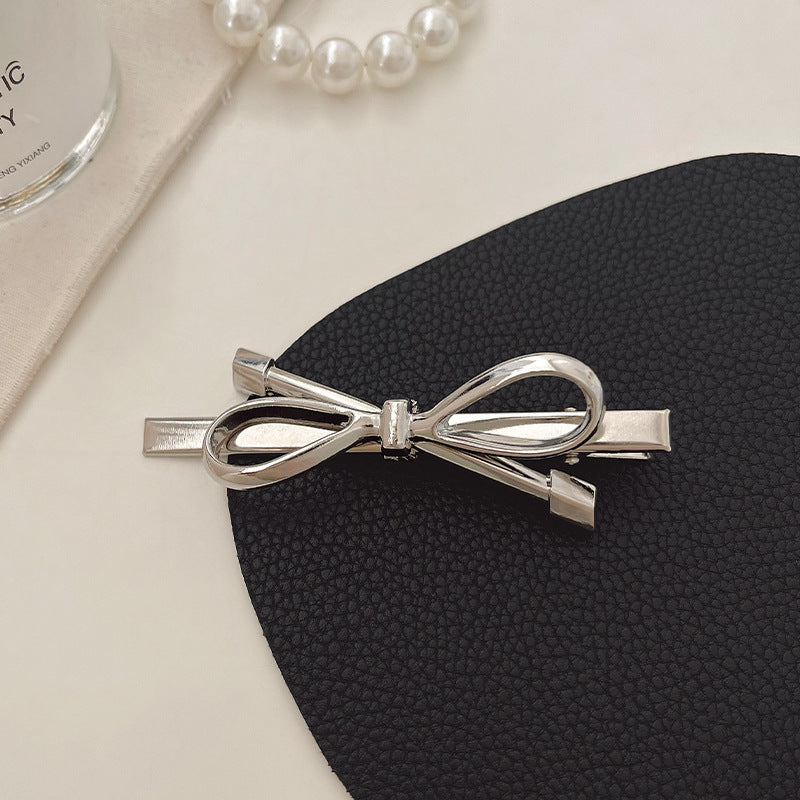 Silver Bow Barrettes Women